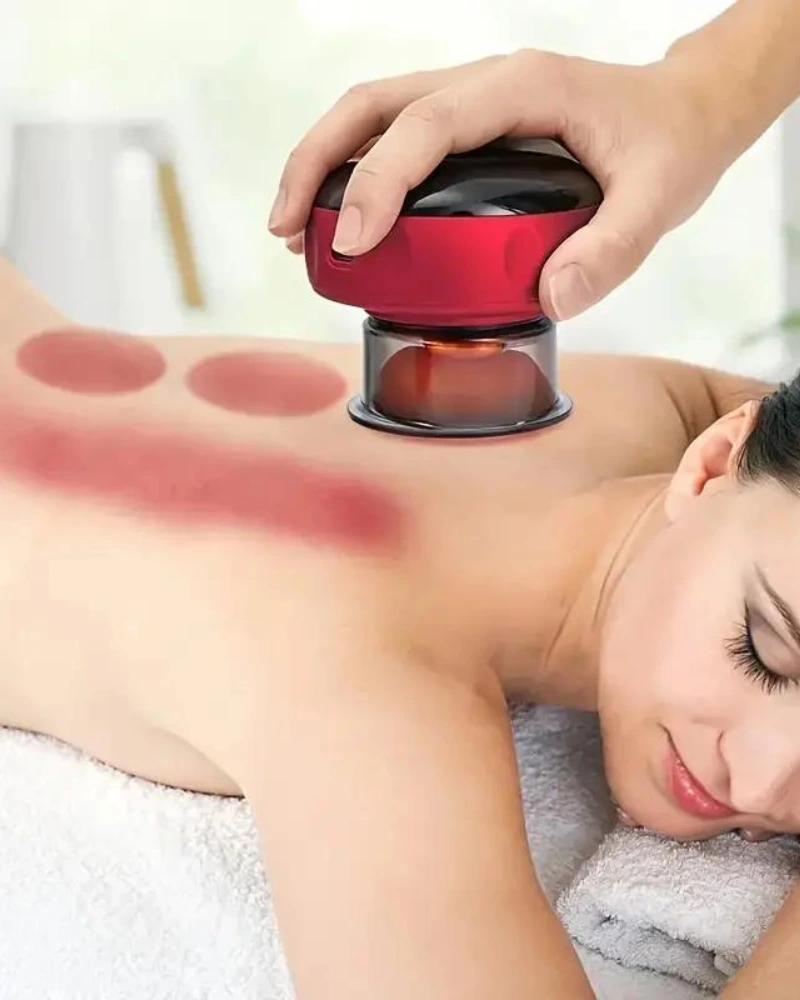 lady relaxing with Cupping Massager on her back